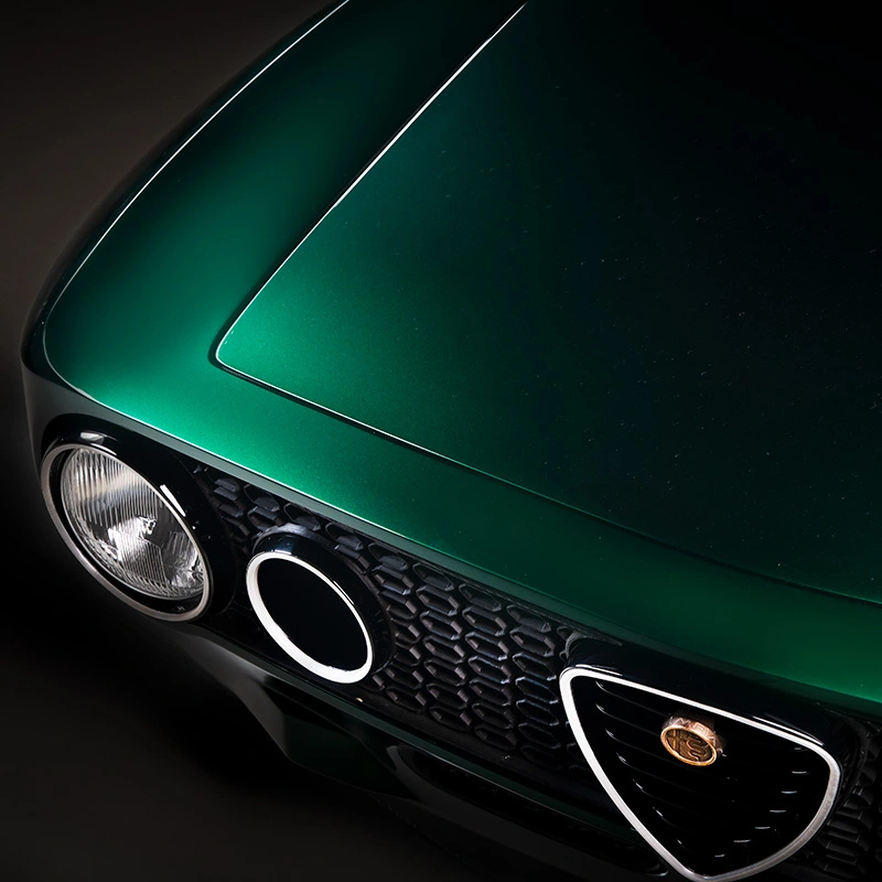 Hood of a green car